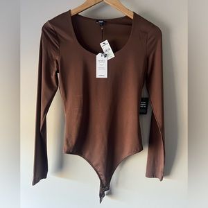 Express body contour chocolate brown thong bodysuit.